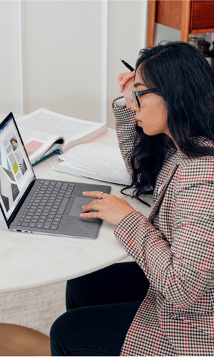 Student sitting at a desk on a laptop